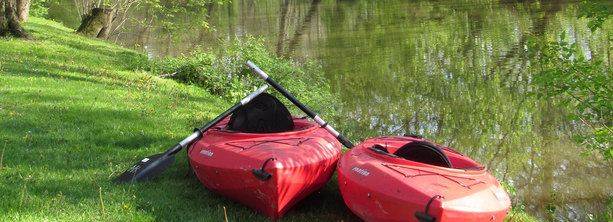 kayaks by creek